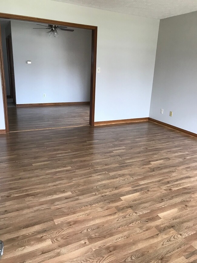living room open to dining area - 11220 Township Line Rd
