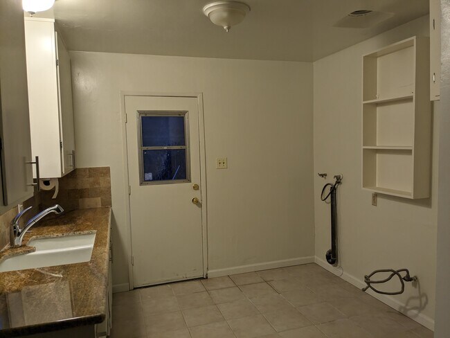 Kitchen with Stove, refrigerator and washer - 418 Real Rd