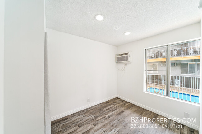 Building Photo - 7076 1/2 Lanewood Ave-16A