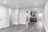 Located at 222 W Groveland Ave in Somers Point, NJ, this thoughtfully updated one-bedroom, one-bathroom unit offers a clean, modern aesthetic throughout its efficiently designed single-floor layout. The open-concept kitchen and living area serves as the heart of the space, where sleek gray shaker cabinets, white quartz countertops, a subway tile backsplash, and stainless steel appliances — including a dishwasher, range, and built-in microwave — create a functional and stylish kitchen. The living area extends seamlessly from the kitchen, featuring light wood-tone luxury vinyl plank flooring, recessed lighting, and neutral walls that lend a bright, airy feel. The bedroom offers comfortable carpeted flooring, a window for natural light, a wall-mounted air conditioning unit, and baseboard heating. A dedicated closet provides convenient storage. The bathroom is well-appointed with a soaking tub and shower combo, striking multi-toned linear mosaic tile surround, matte black hardware and fixtures, a dark vanity, and neutral floor tile, delivering a contemporary and polished finish. A hallway connects the spaces cleanly, with a double-door closet adding extra storage. Recessed lighting throughout enhances the modern feel of this move-in-ready unit.