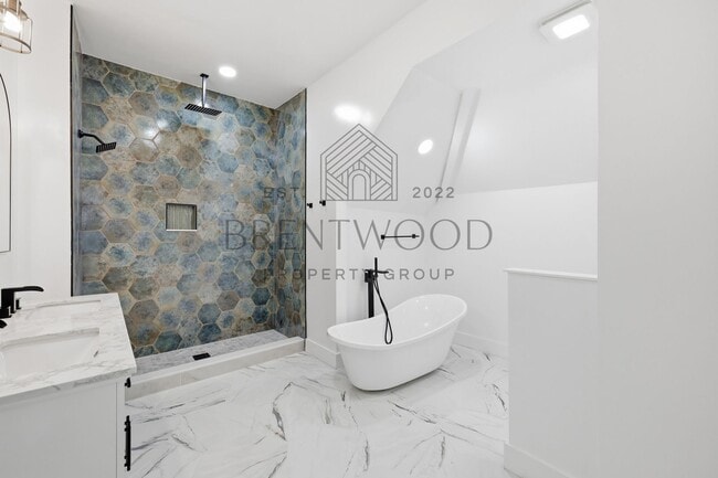 Photo - Fully Renovated 4bed, 3bath Home with Fenced In Yard