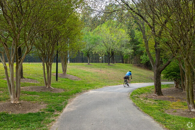 Locals can walk or bike the looping paved trail at Baileywick Road Park.
