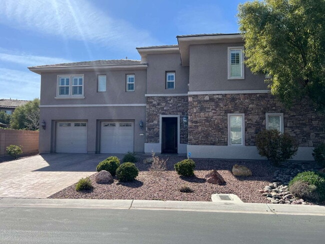 Building Photo - 5-Bed Retreat with Granite Elegance & Cozy Fireplace – 3690 Sq Ft of Comfort in Las Vegas with a ...