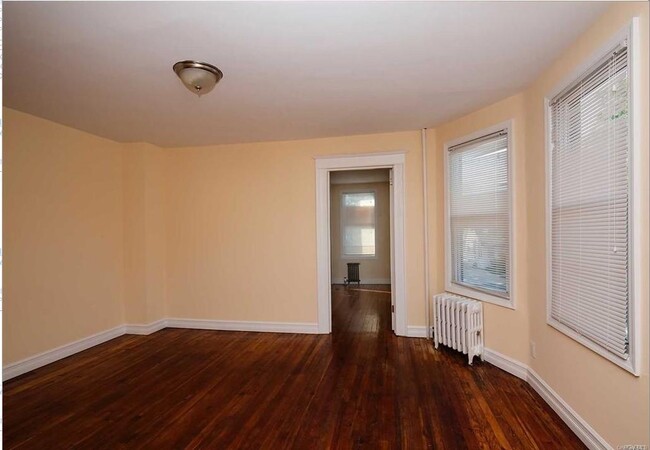 Building Photo - 261-10 86th Ave