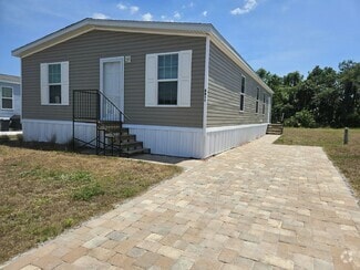 Building Photo - 6680 Hidden Oaks Dr