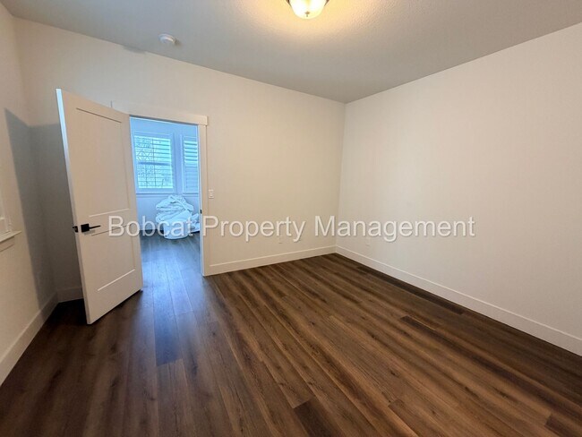 Building Photo - Modern Lock-and-Leave Living in the Heart of Carson City