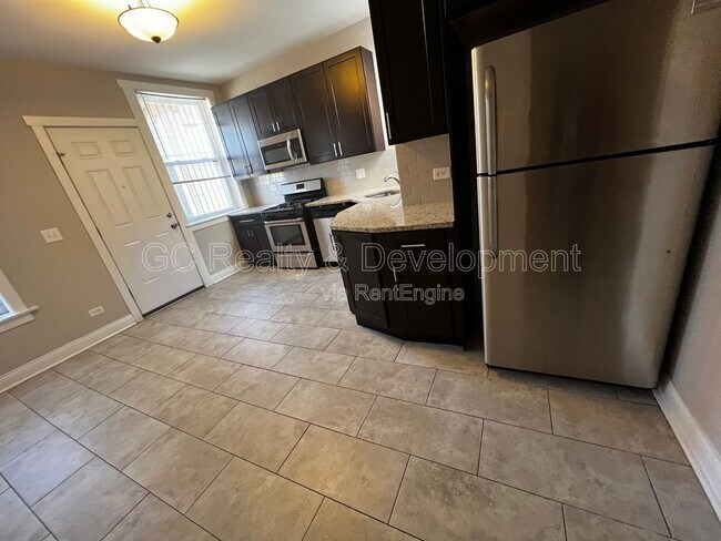 Foto del edificio - 6031 S Eberhart Ave