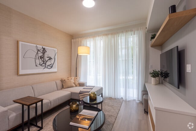 1BR, 1BA - 609SF - Living Room - Resia Golden Glades