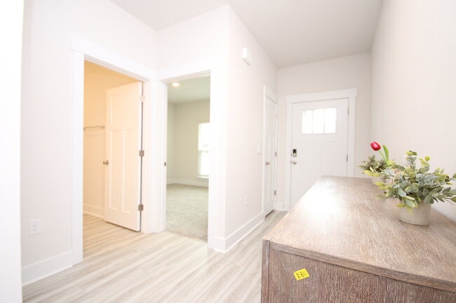 Building Photo - Don’t Miss This 4BR Avalon Home — Modern Interior, Open Floor Plan & Access to Pool, Volleyball &...