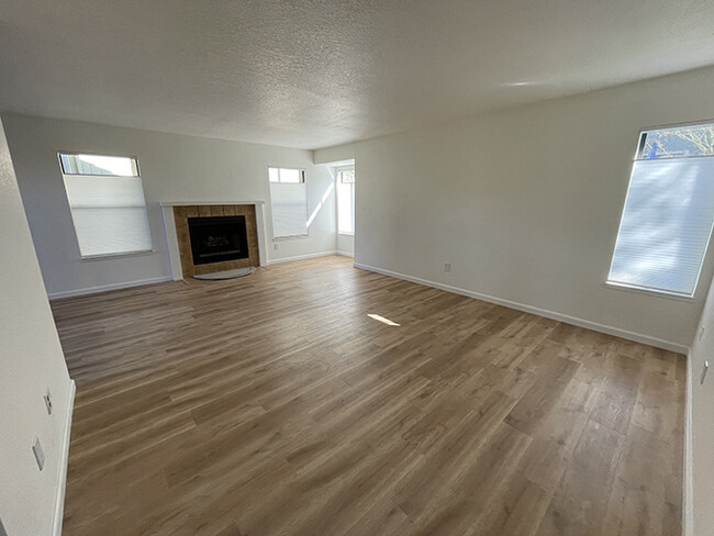 large living room with fireplace - 111 Bean Creek Rd