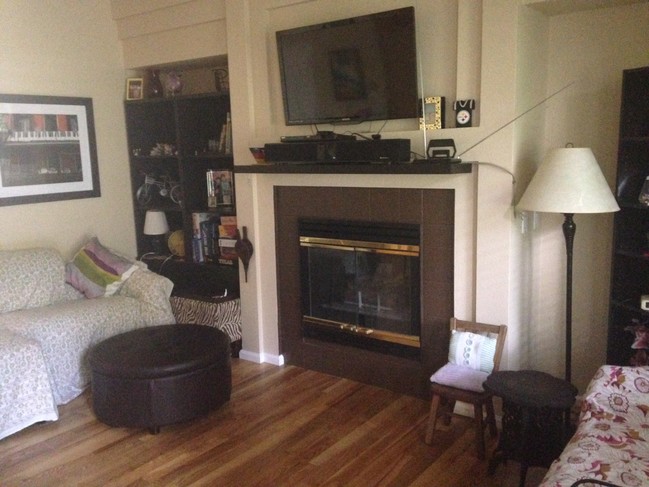 living room with gas fireplace - 1079 S Walden Way