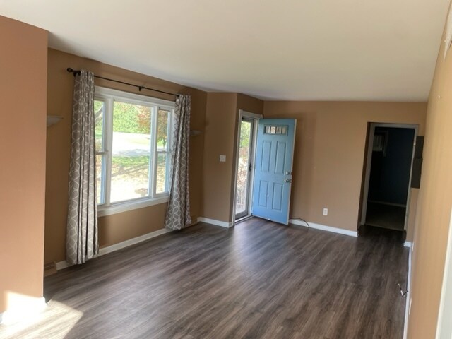 living room overlooking a park like front yard - 3101 Hickory Lawn Rd