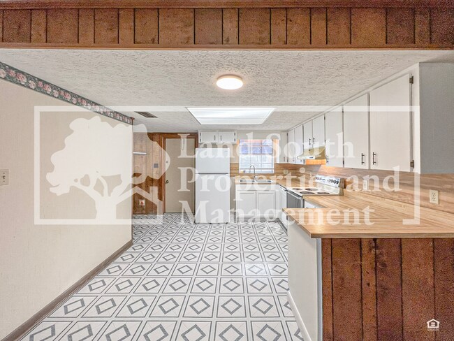 Foto del edificio - 711 W Daughtery Rd