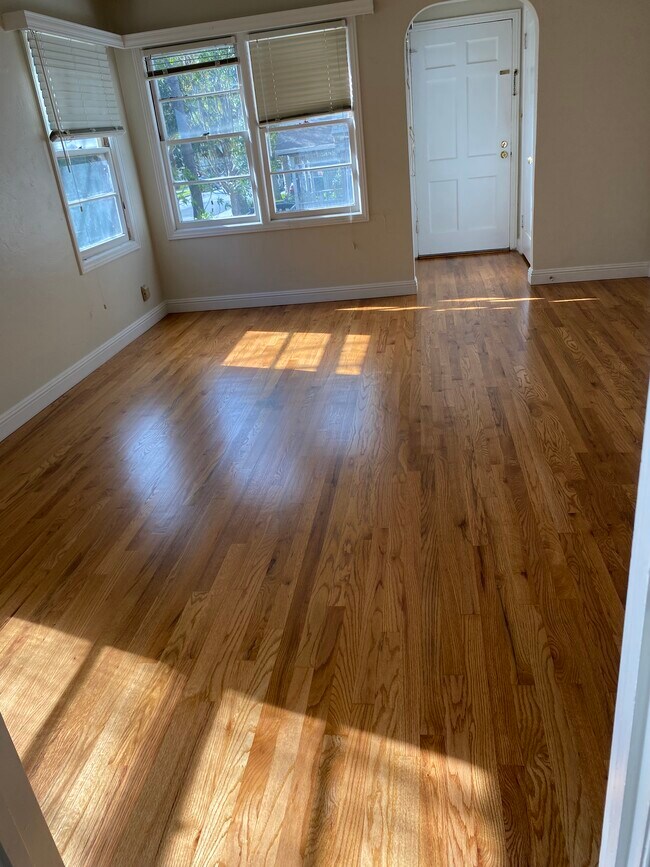 Freshly refinished hair red oak hardwood floors - 864 Myrtle St House