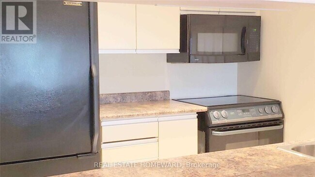 Photo du bâtiment - 701 King St W