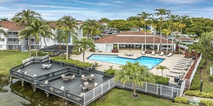 Building exterior with swimming poll and sitting area - Avana at the Moors