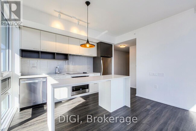 Photo du bâtiment - 55-4355 Gerrard St W