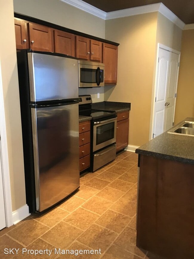 Building Photo - 1 br, 1 bath Apartment - Village at Tradit...