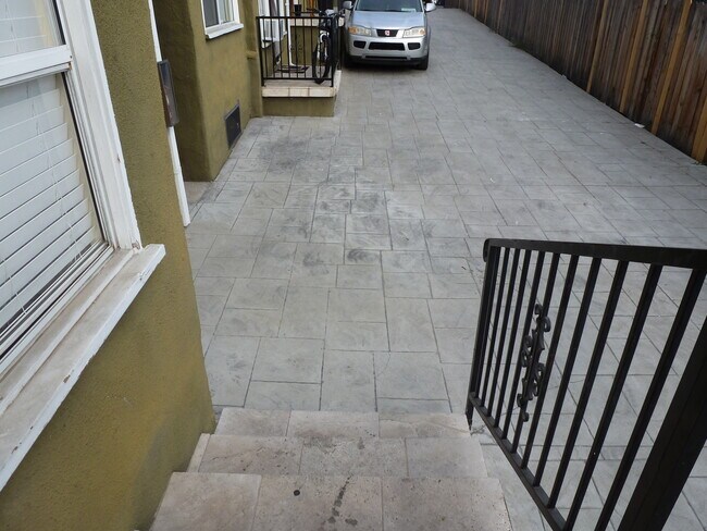 Uncovered parking space available - 721 N Madison Ave