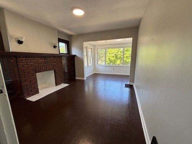 Building Photo - Classic 1928 Goodyear Heights charmer—fire...