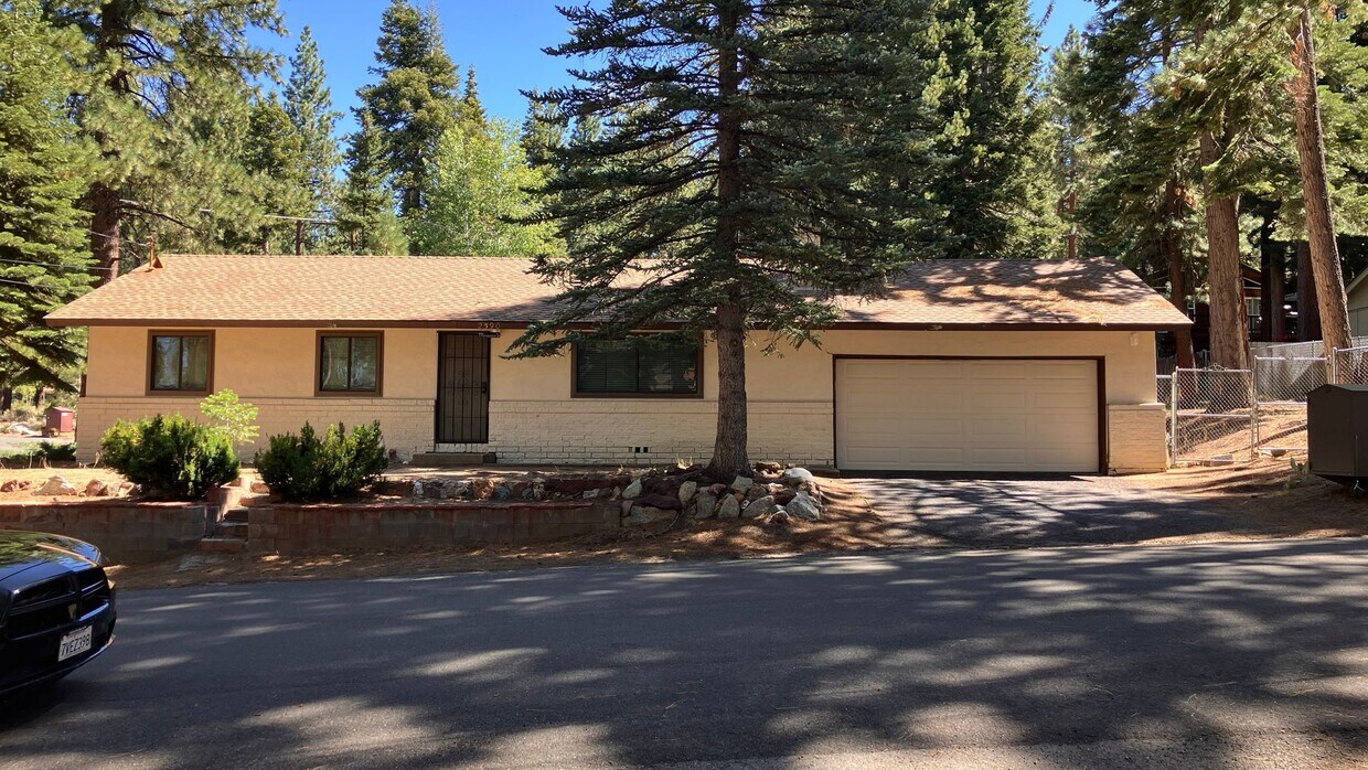 Primary Photo - One level cabin with garage and fenced in ...