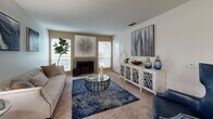 Located at 2651 Sunset Blvd in Rocklin, California, this well-appointed two-bedroom, two-bathroom residence offers comfortable single-floor living. The layout flows naturally from a welcoming entrance through a hallway connecting all main areas of the home.

The living room serves as the heart of the space, featuring a tile-surround fireplace flanked by windows that invite natural light. Neutral carpet and warm wall tones create an inviting atmosphere throughout. The adjoining dining area provides an intimate setting ideal for everyday meals or entertaining.

The kitchen is equipped with light wood cabinetry, granite-style countertops, a double basin sink, and white appliances including a range, microwave, and dishwasher. Wood-style flooring adds a clean, durable finish to this functional space.

Both bedrooms offer comfortable proportions with plush carpet, natural light from well-positioned windows, and ample room for furnishings. The primary bedroom includes access to a private area and features soft, neutral tones. Each bedroom is served by its own full bathroom, both equipped with tub-shower combinations, vanities with granite-style countertops, and light wood cabinetry. A dedicated closet provides additional storage. The overall ambiance is calm, clean, and move-in ready.