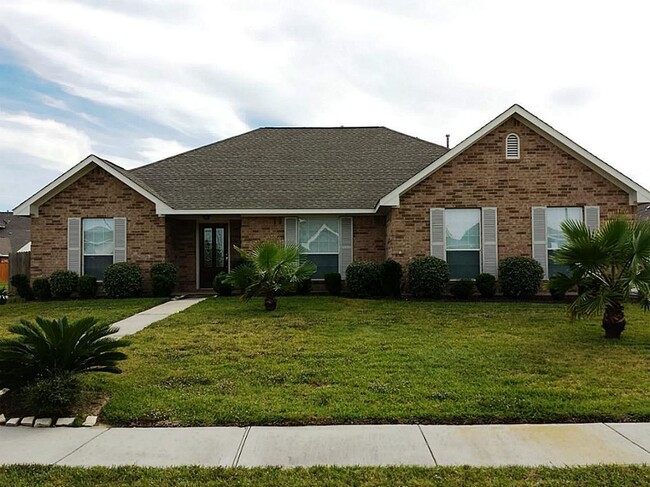 Front View of the House. Corner lot. Long Driveway. - 11502 Grimes Ave.