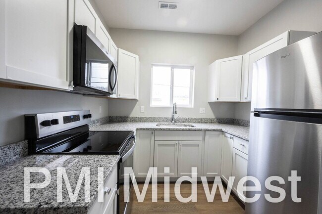 Building Photo - "Charming 2-Bedroom Gem with 1.5 Baths on East Michigan Street – A Cozy 949 Sq. Ft. Haven in Indi...