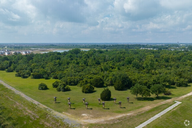 57 Acre Park is a large, wooded park with hiking trails, a playground, and a dog park.