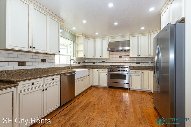 Building Photo - 4 br, 3.5 bath House - 312 Harvard St.