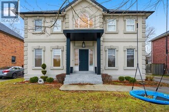 Building Photo - 1294 Outram Ave