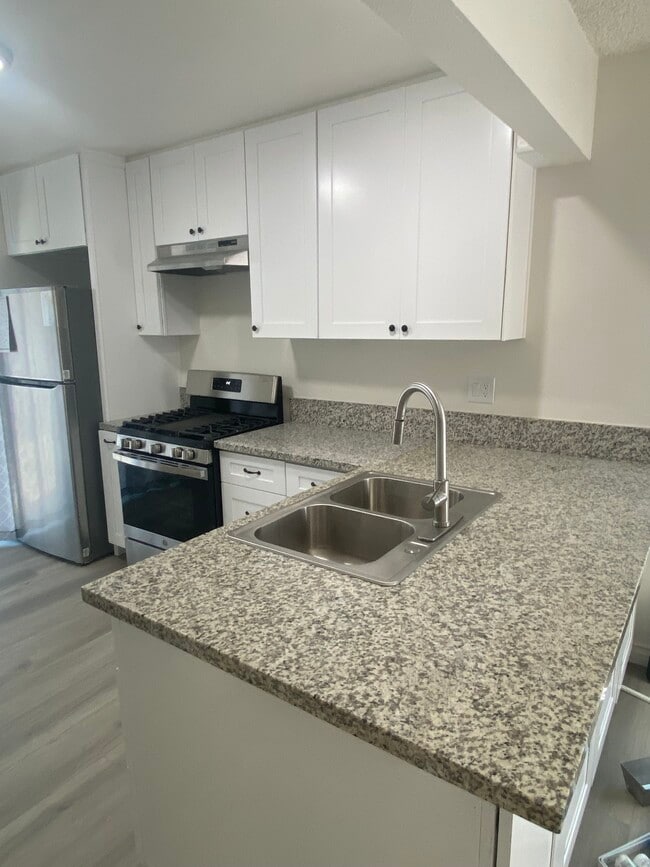 New Cabinets, Counter Tops, - 11656 Coldbrook Ave