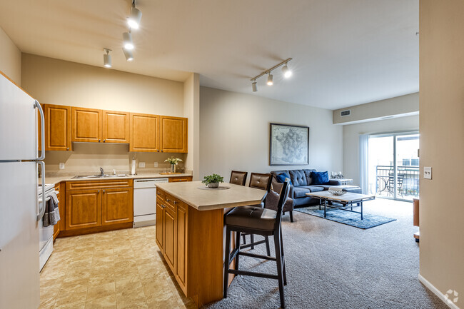 2BR, 1BA - 1029SF - Kitchen and Living Room - Graham Place Senior Living