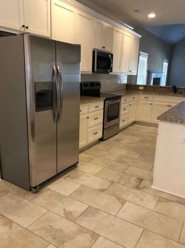 Foto del edificio - 1117 Runningvine Ln