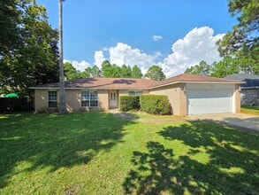 Building Photo - 7436 Woodmont Rd