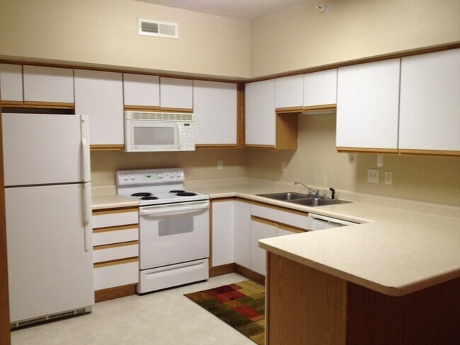 Foto del edificio - $1,195 | 2 Bedroom, 1 Bathroom Condo | Cat...