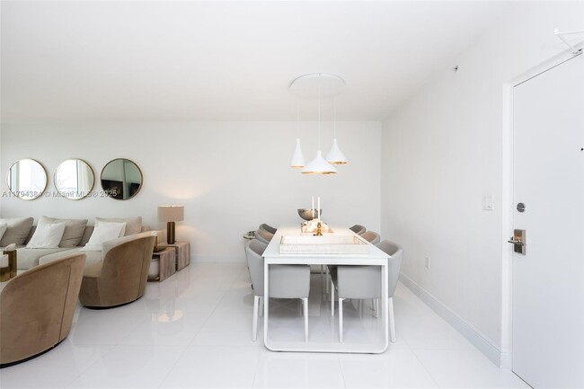 Building Photo - 10275 Collins Ave