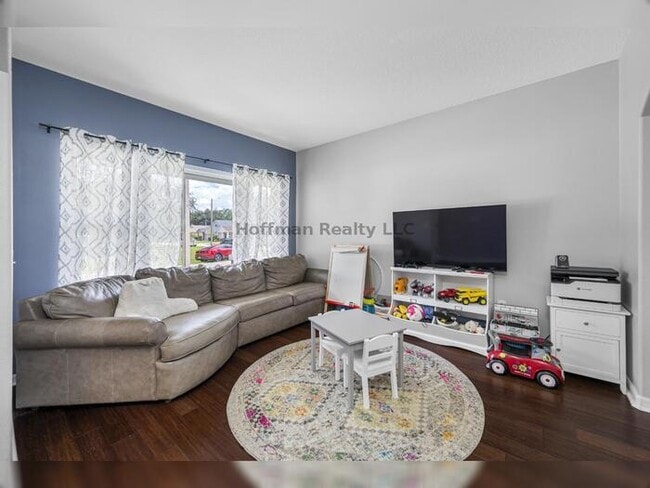 Building Photo - Stunning Renovated Home with EV Charger in...