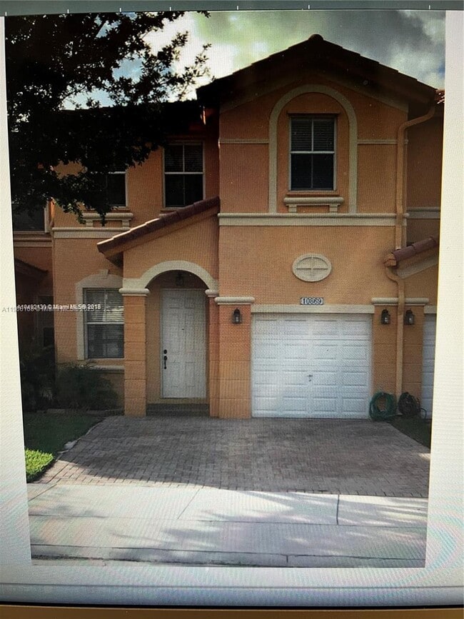 Building Photo - 10869 NW 79th St