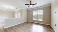 Step into a world of possibility at 1524 Woodfield Drive, where your aspirations become reality. This charming 2-bedroom, 1-bathroom home spans 1,230 square feet of thoughtfully designed space, offering the perfect canvas for your dream lifestyle.

Imagine waking up in the spacious 210 square foot primary bedroom, where streams of natural light dance across plush carpeting, creating a serene sanctuary for restful nights and inspiring mornings. The second bedroom, equally inviting, provides versatile space for a home office, guest room, or personal retreat.

The heart of this home beats in its stunning kitchen, where rich wood cabinetry meets sleek stainless-steel appliances and gleaming granite countertops. Here, culinary enthusiasts will find their paradise, with ample space to create memorable meals and entertain loved ones.

The open-concept living area beckons with its airy ambiance, highlighted by large windows that frame picturesque views and flood the space with warmth. Stylish ceiling fans and elegant light fixtures add both comfort and sophistication, while the seamless flow between rooms creates an ideal setting for both relaxation and socializing.

Practicality meets luxury in the well-appointed bathroom and convenient laundry area, ensuring that everyday tasks become effortless. The harmonious blend of carpet and wood-look flooring throughout the home adds texture and character to each space.

Located in the desirable Wake Forest area, this home offers not just a place to live, but a lifestyle to embrace. Whether you're a first-time homebuyer, downsizing, or seeking the perfect investment property, 1524 Woodfield Drive presents an opportunity to turn your homeownership dreams into reality. Don't miss your chance to make this house your home and start living the life you've always imagined.