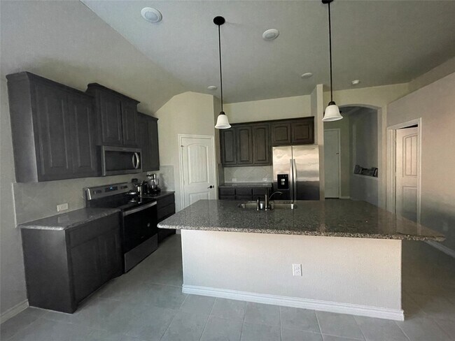 Foto del edificio - 7208 Windy Ridge Dr