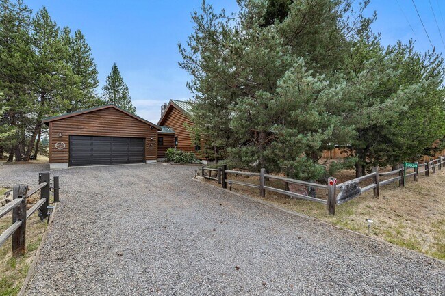 Building Photo - Log home on 3.57 riverfront acres with stu...