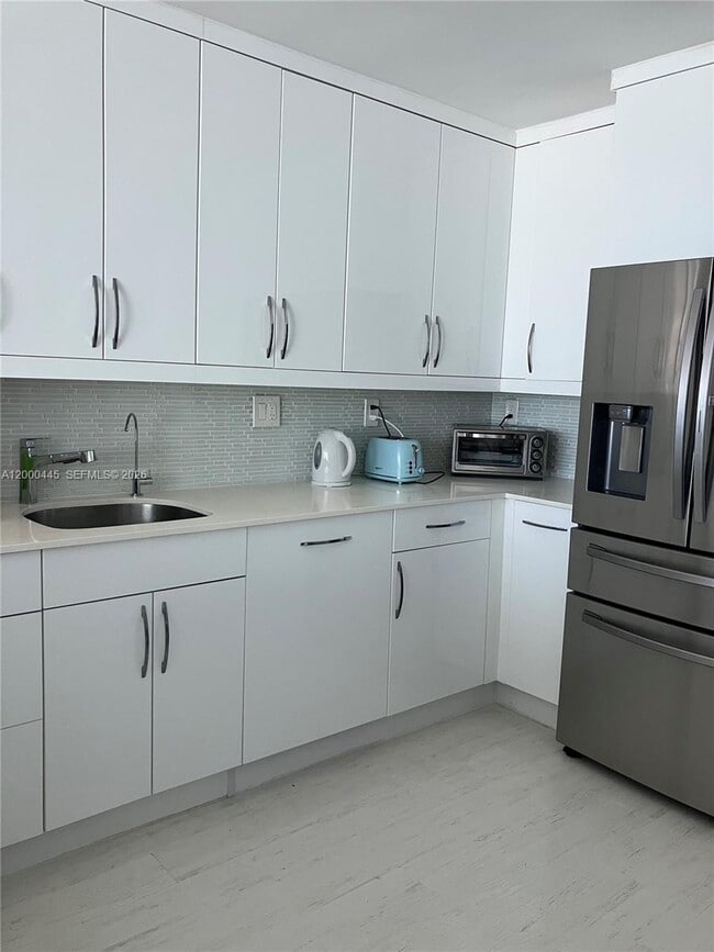 Building Photo - 3180 S Ocean Dr