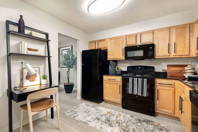 Spacious Kitchen with Eating Nook - Plainview Apartments