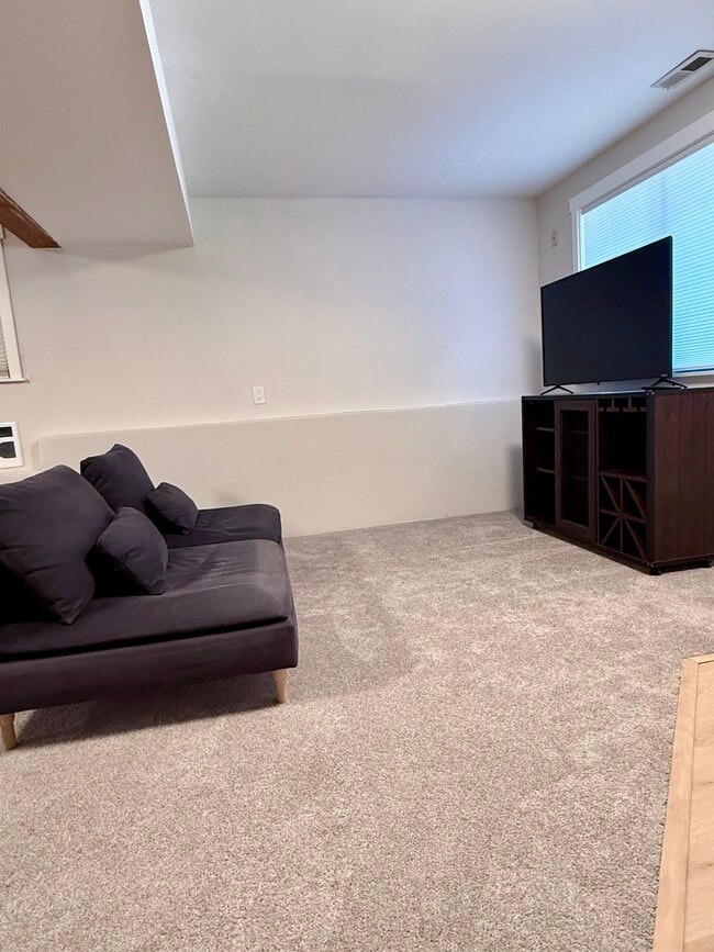 Living Space with couch & TV - 5129 137th St SE