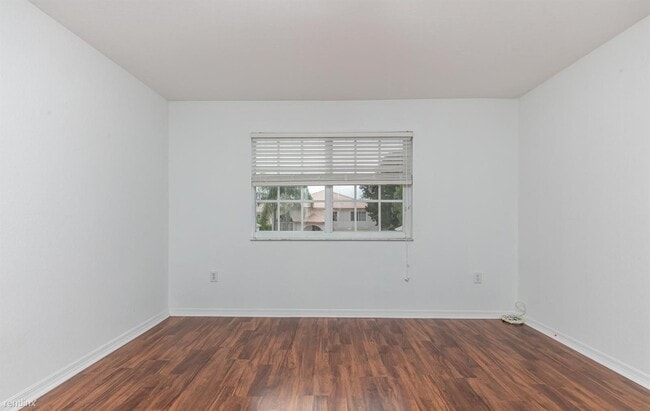 Building Photo - 4 br, 3.5 bath House - 1995 NW 169th Ave