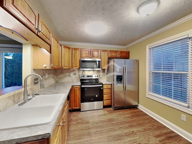 Building Photo - 6707 Wimbledon Dr