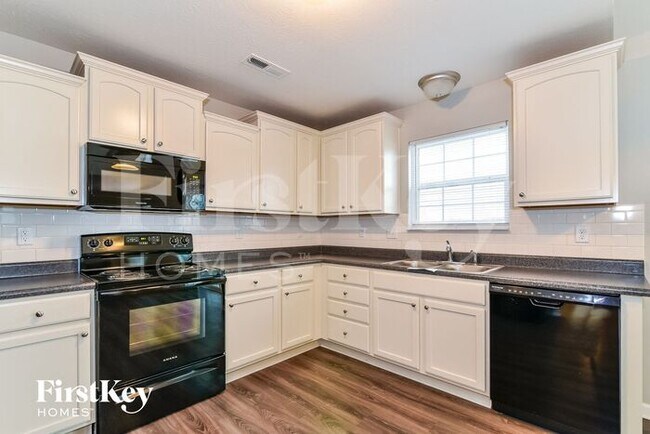 Foto del edificio - 7530 Boundary Bay Ct