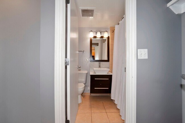 Building Photo - Available Now! Electric, Gas and Water included in Rent! Spacious Studio in an Amenity Rich Build...