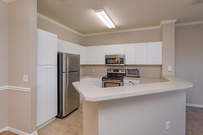 Building Photo - Gated Community of Mosaic 1 Bedroom